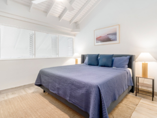 Bedroom in VOG unit 19, Seven Mile Beach Condo Rental