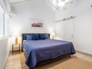 Bedroom in VOG unit 19, Seven Mile Beach Vacation Rental