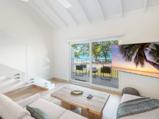 Living Room in VOG unit 19, Seven Mile Beach Vacation Rental