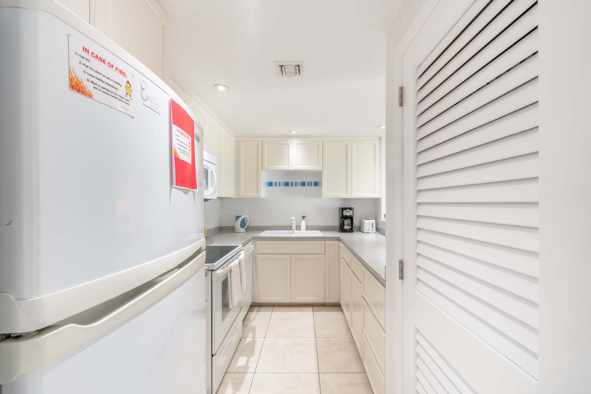 Kitchen in VOG unit 7, Seven Mile Beach Condo Rental